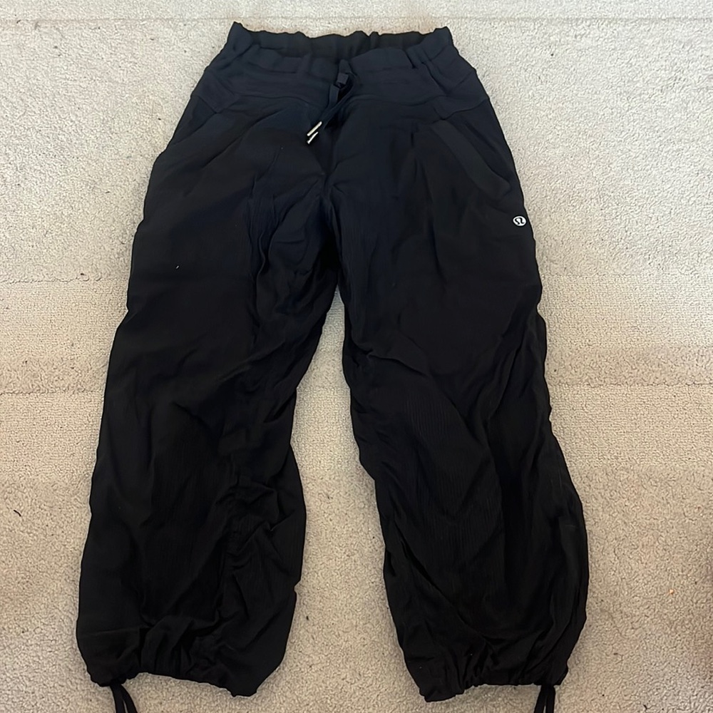 Lululemon black capri studio jogger pants with adjustable hem